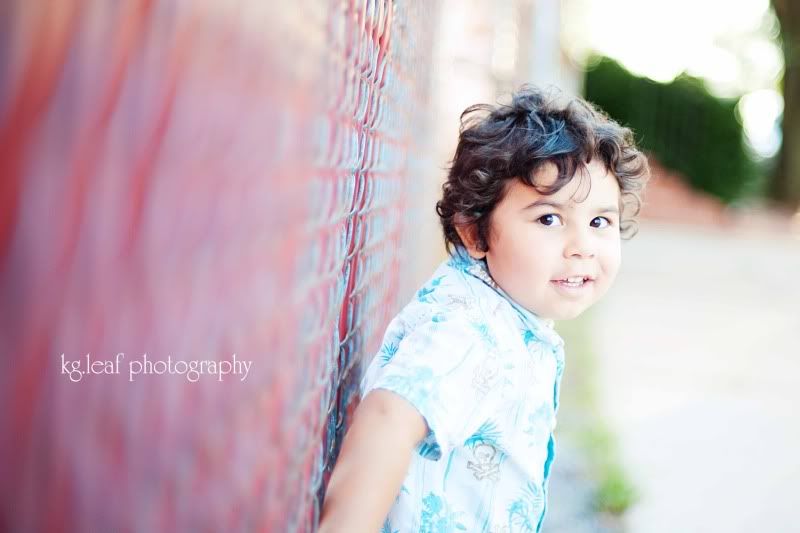 boy against fence