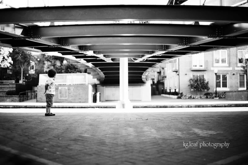 boy under bridge