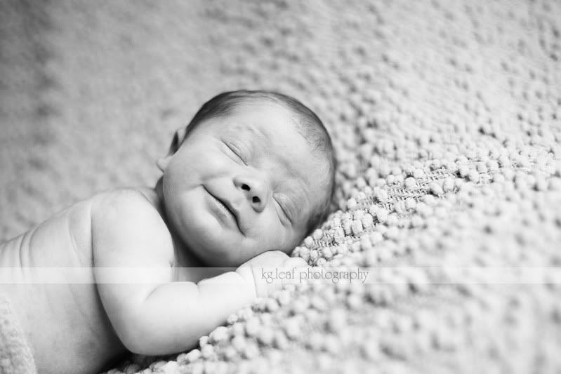 kg.leaf photography newborn baby smile